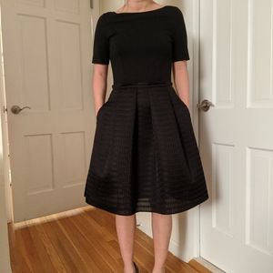 Black fit and flare boatneck dress